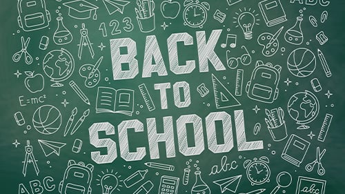 Back to school written on chalkboard