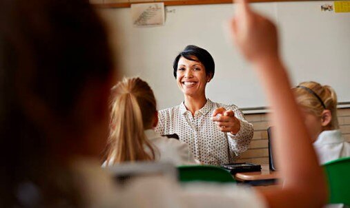 students and teacher in a class