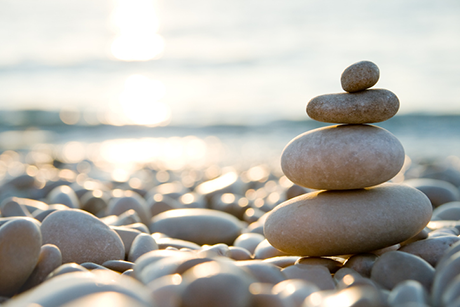 stones stacked on beach
