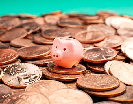 piggy bank and pennies