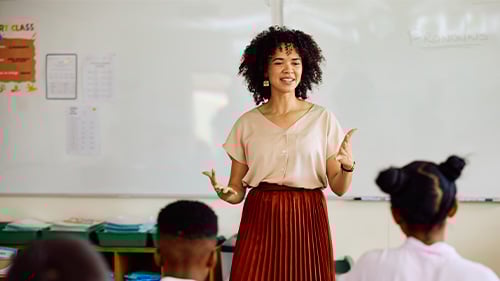 Teacher speaking to elementary students