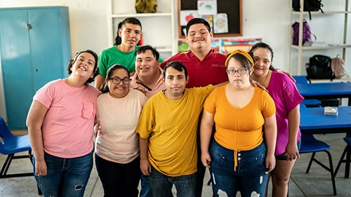 An group of students in a classroom with disabilities