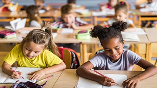 elementary school students working on an assessment
