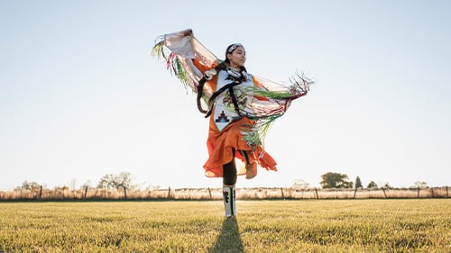 Native American woman in traditional dress