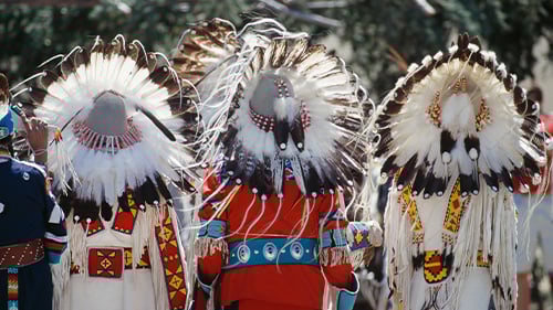 Native American men in traditional dress