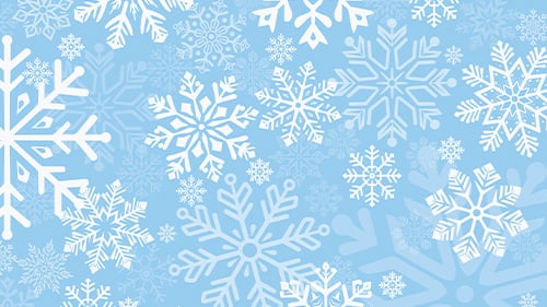 Snowflakes against blue background