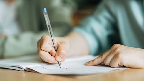 High school student writing essay