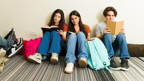 High school students reading together