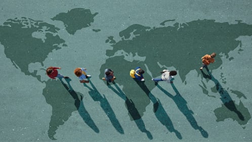 Students walking across map