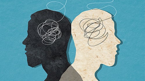 two illustrated heads facing away from each other. Strings appear to come out of their heads and attach to each other. 