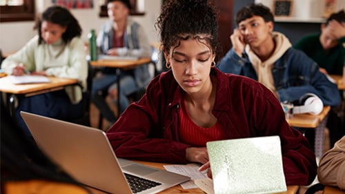 High school student working on essay