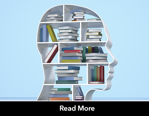 shelf shaped like a head with stacks of books inside it 
