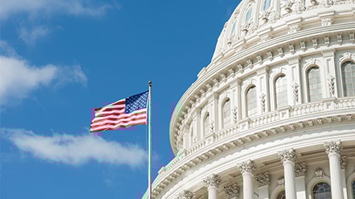 United States Capitol Building and American flag